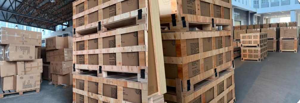 Packed furniture cartons inside protective wooden frames