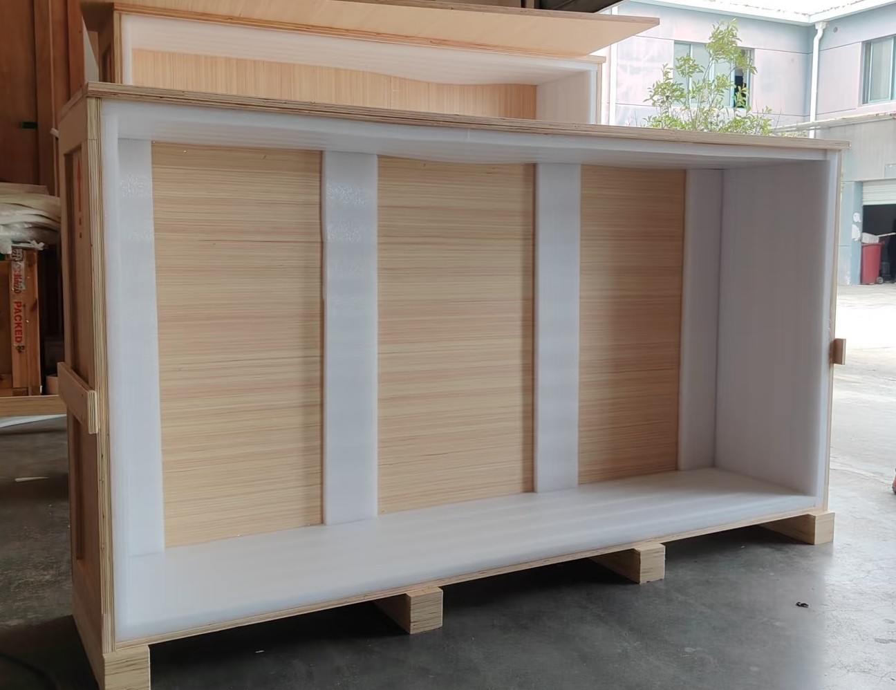Cabinetry secured inside a plywood export crate