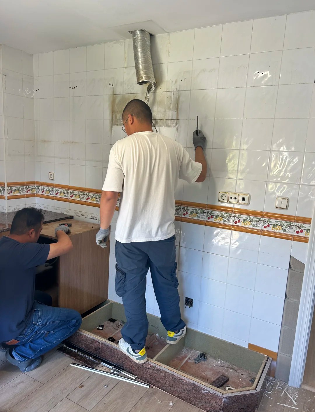 Crew removing the old kitchen