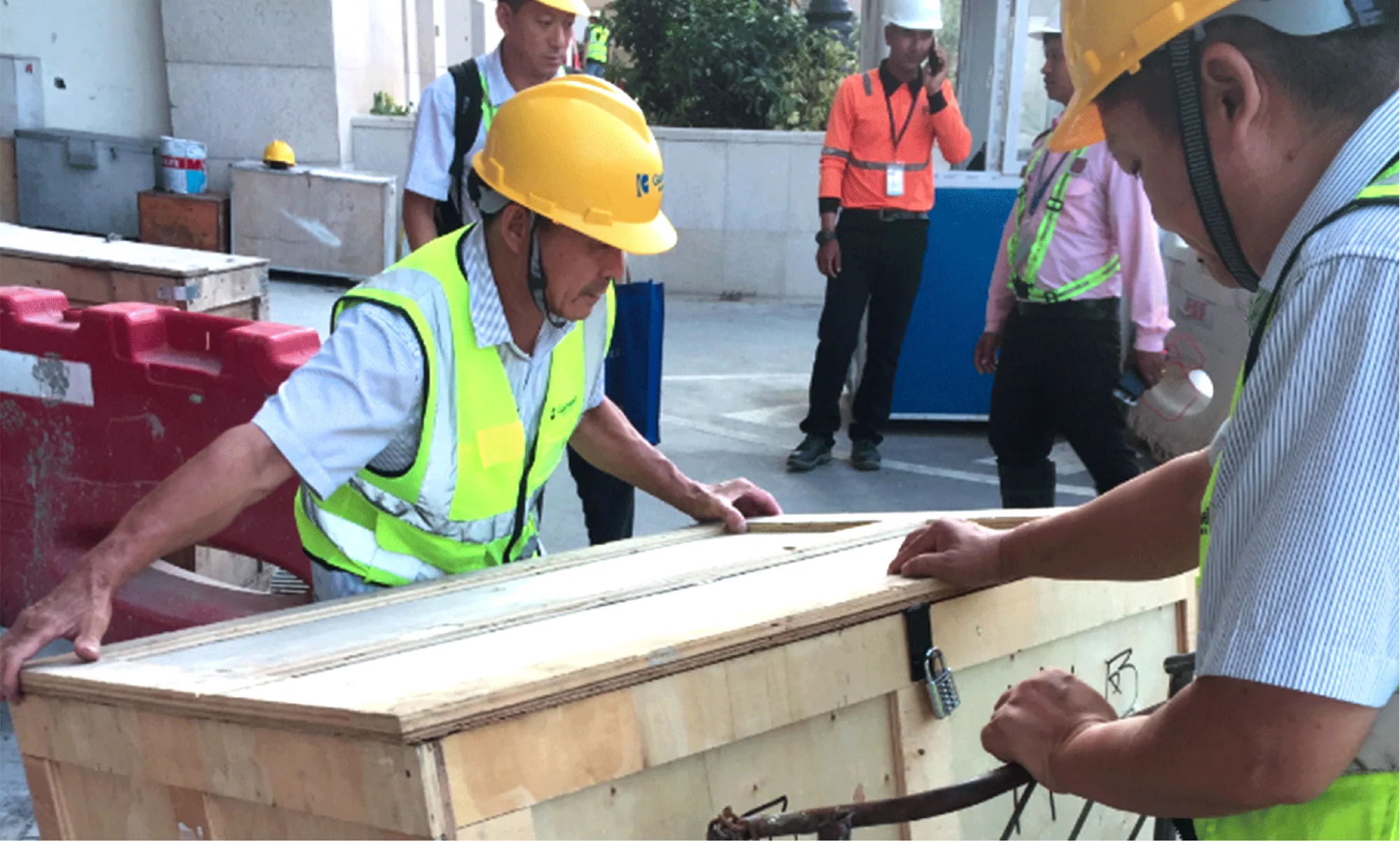 Export crates arriving on site