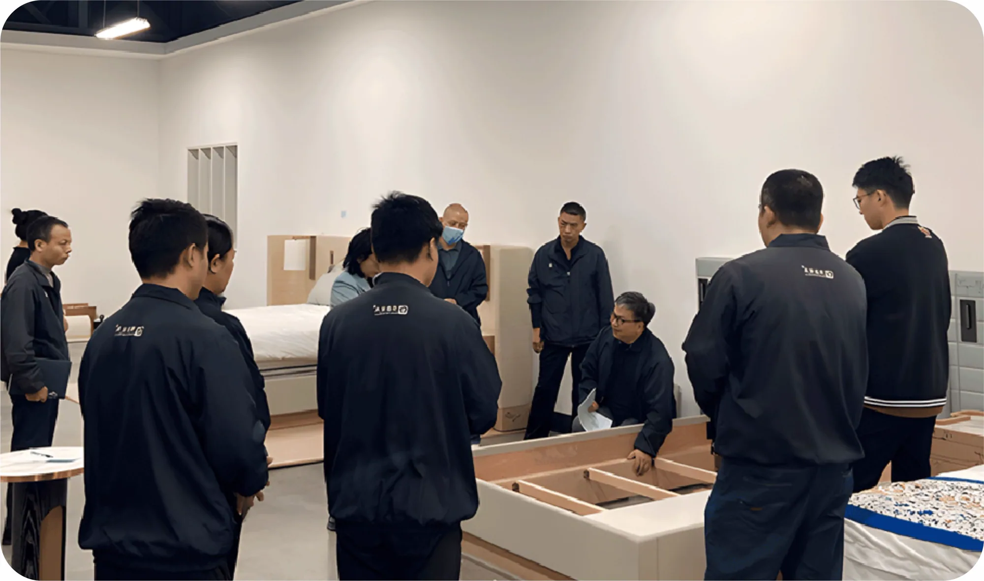 Team reviewing furniture before shipment