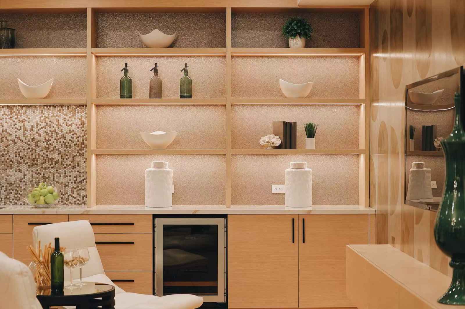 Custom wood cabinetry with integrated lighting, shelving and storage