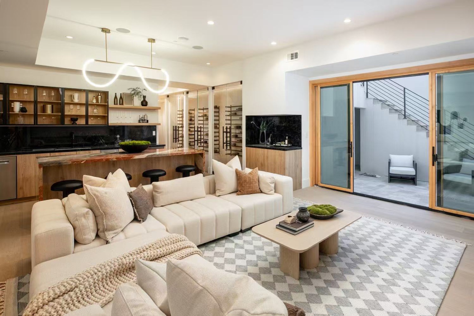 Coordinated living room and kitchen delivered as one whole-home project