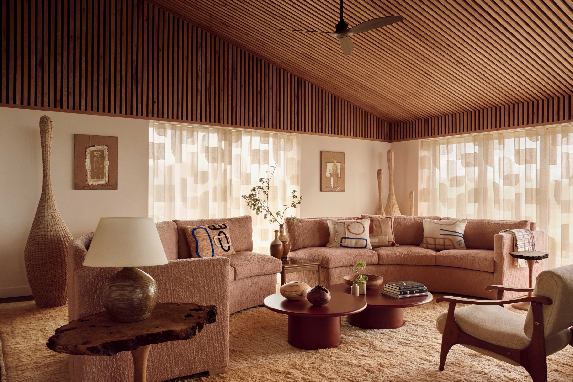 Luxury residence with custom timber ceiling and coordinated seating