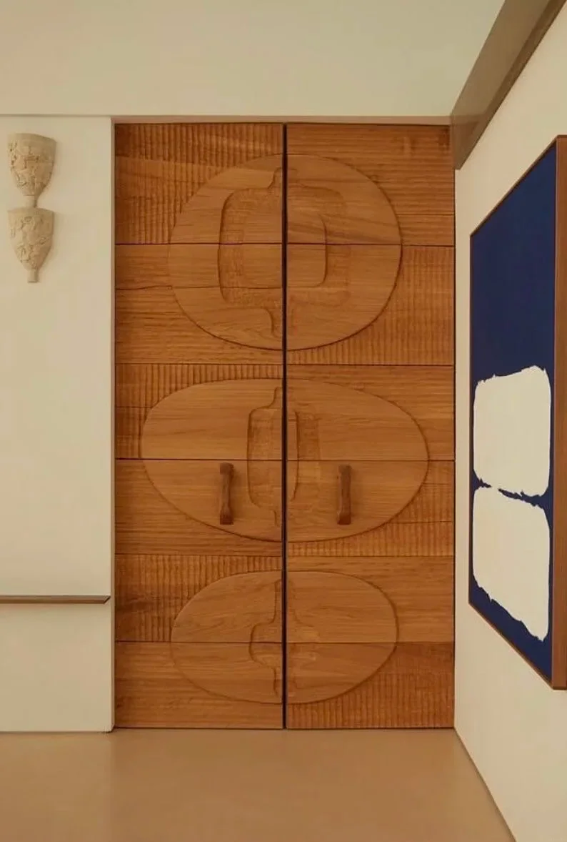 Sculpted relief timber doors