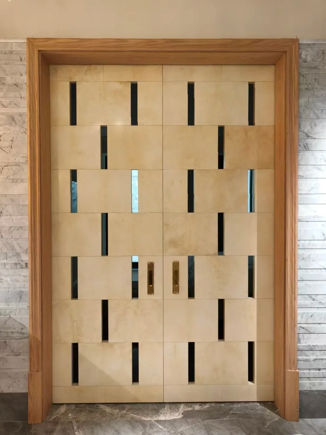 Slotted travertine-finish double door