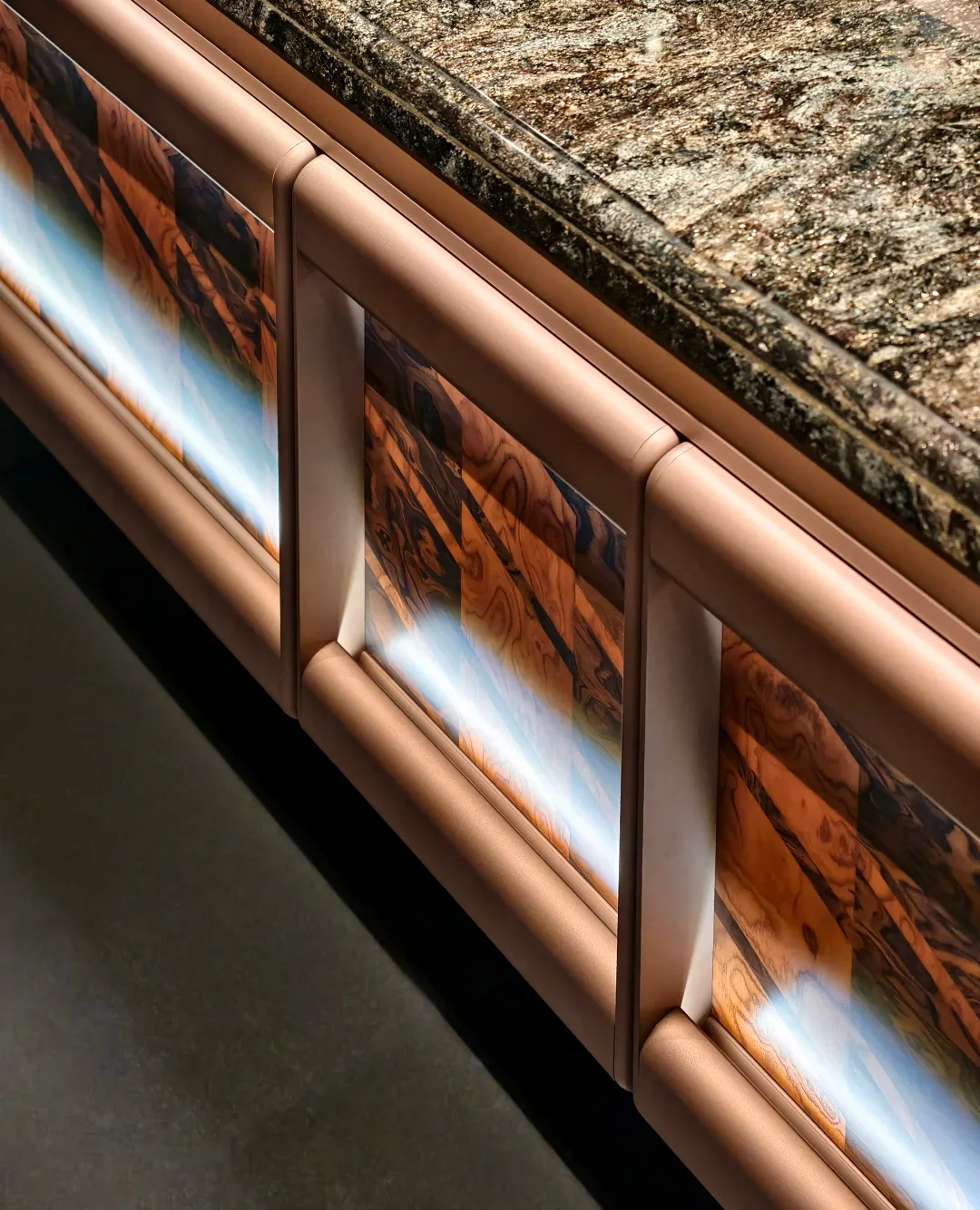 Burl veneer vanity with stone edge