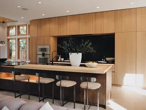 Oak kitchen cabinetry with an island