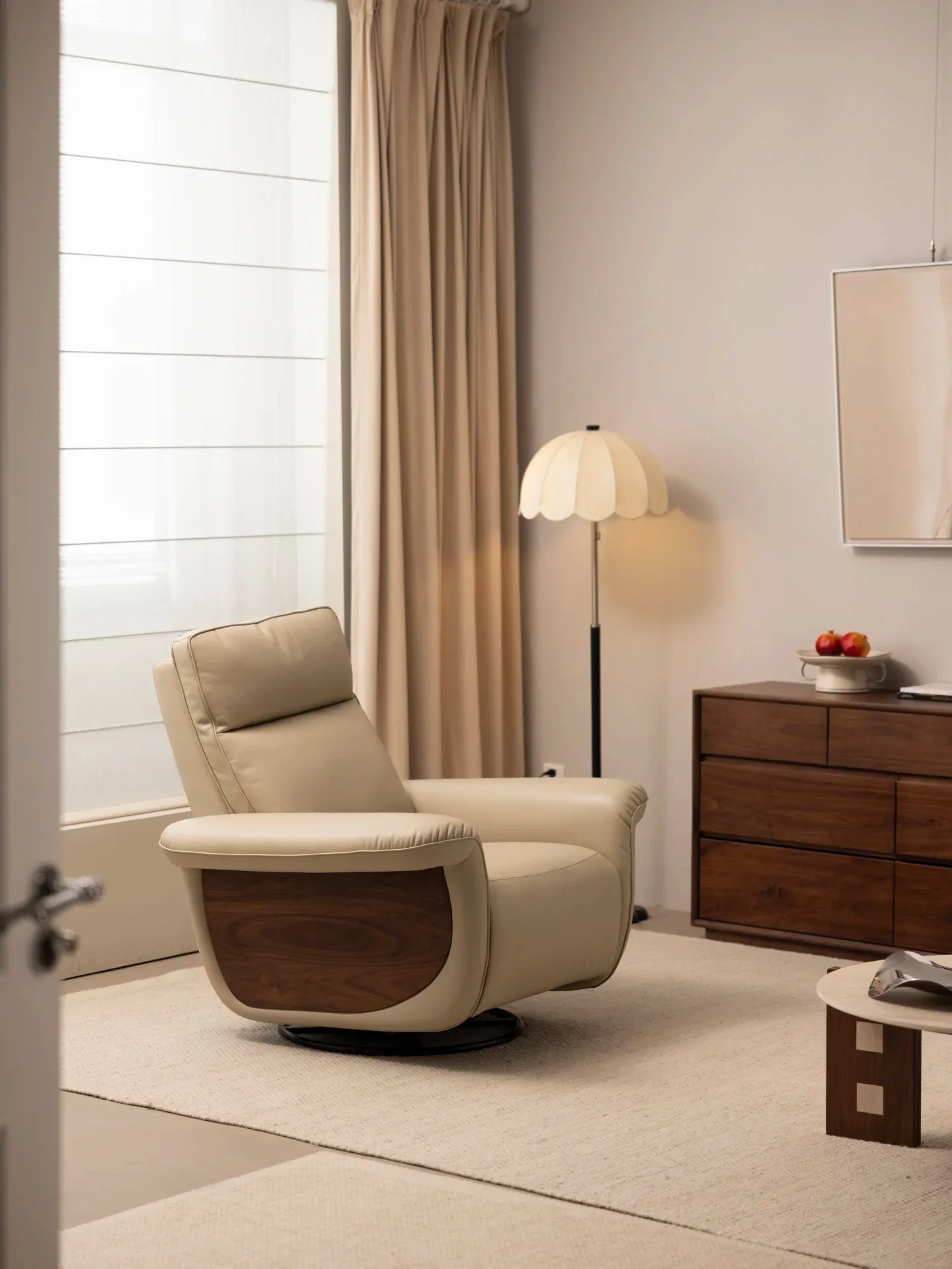 Cream upholstered swivel lounge chair in a neutral room