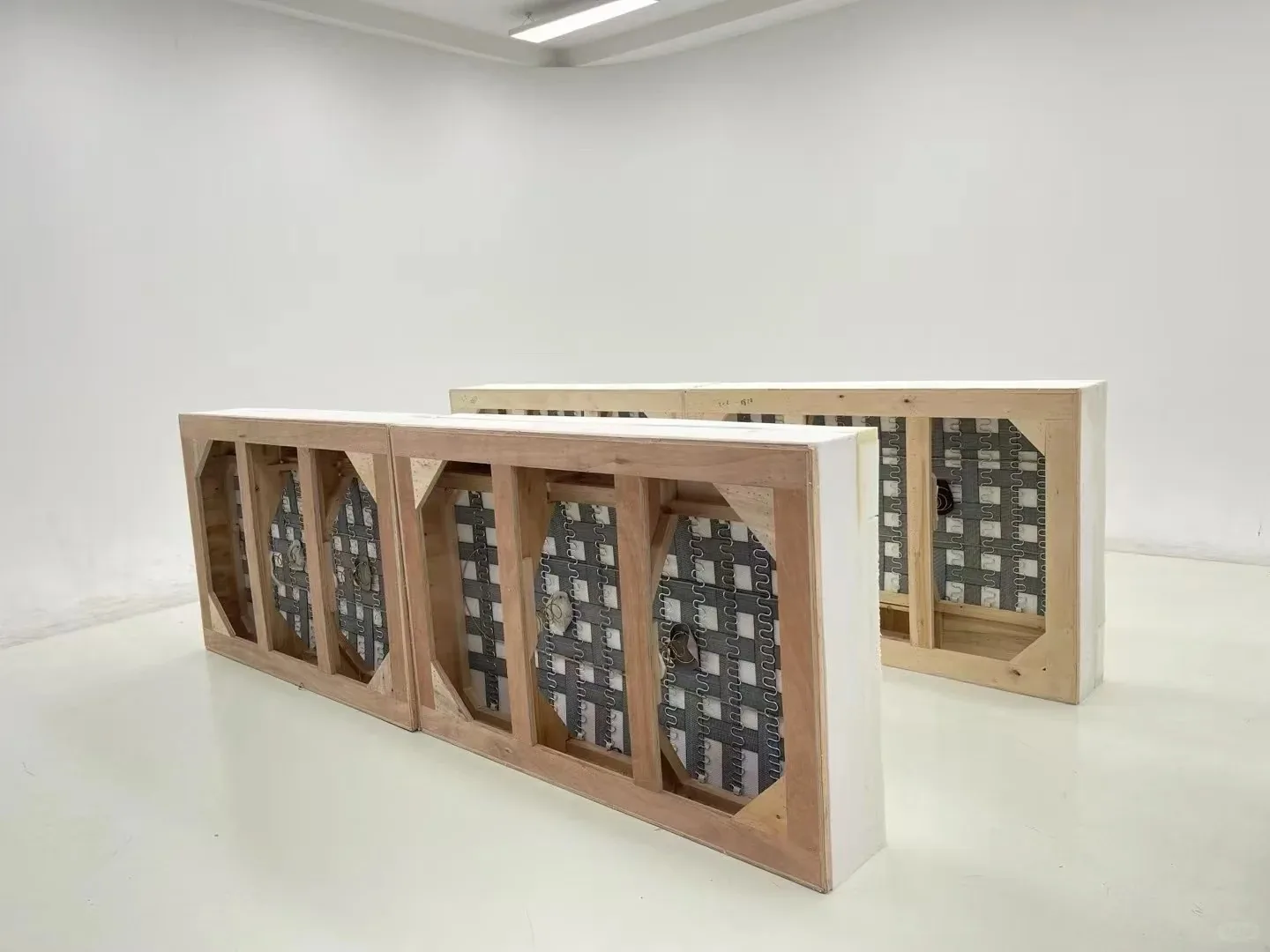 Open sofa back modules showing timber rails, corner bracing and internal spring support