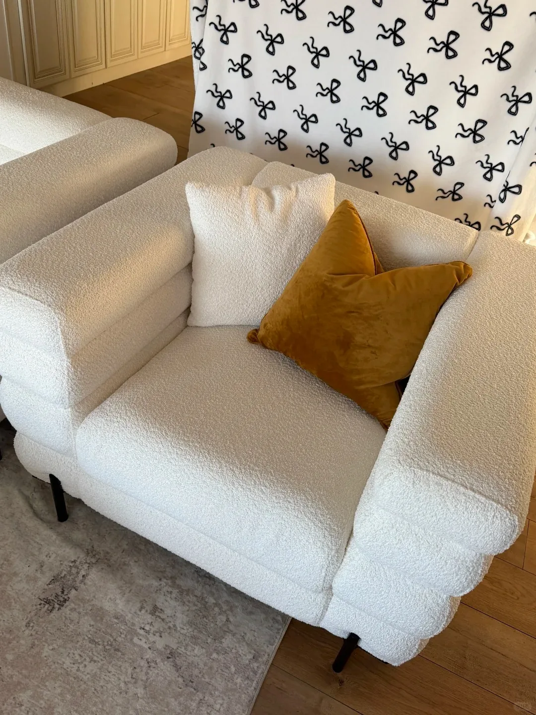 Cream bouclé oversized lounge chair