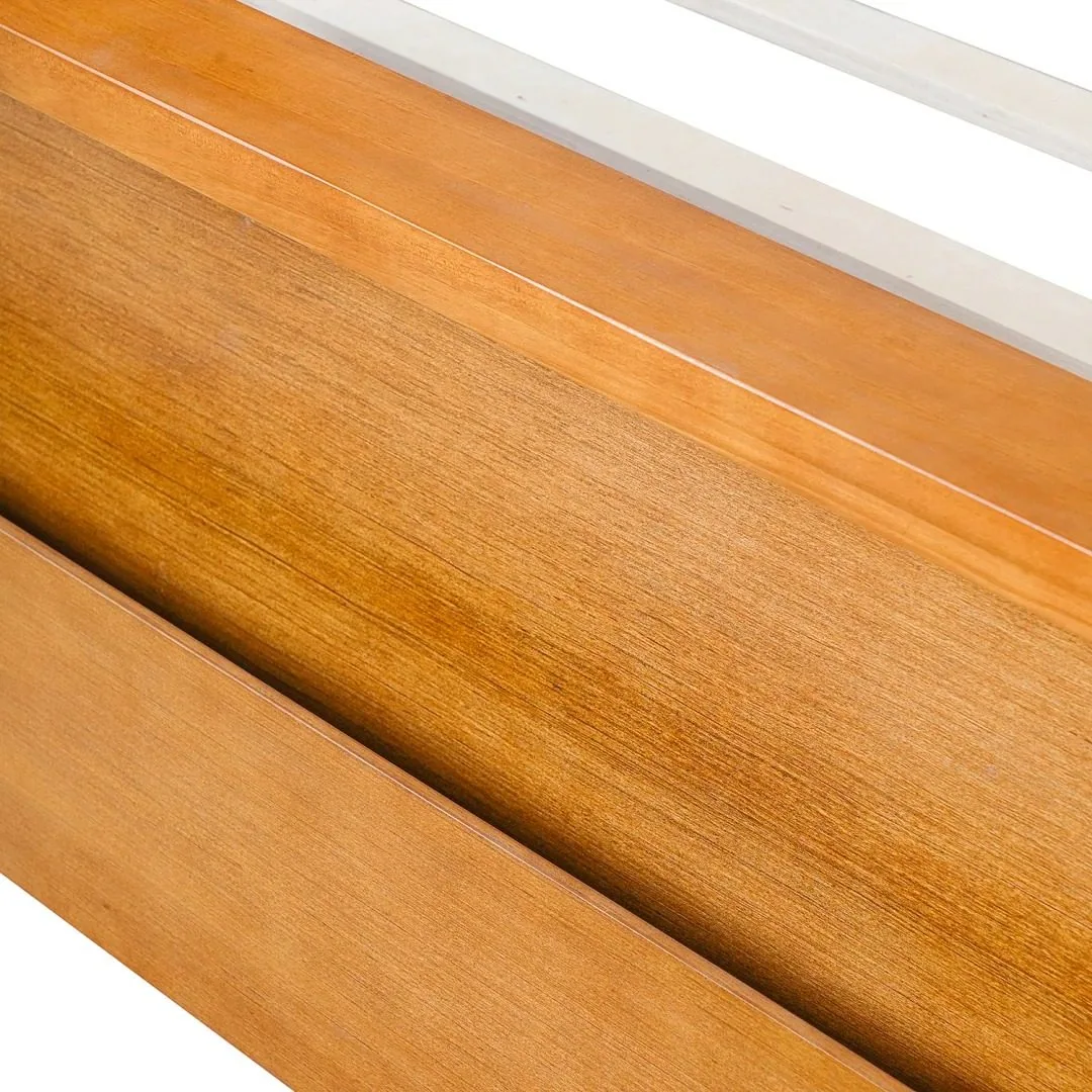 Wood storage detail in bed frame