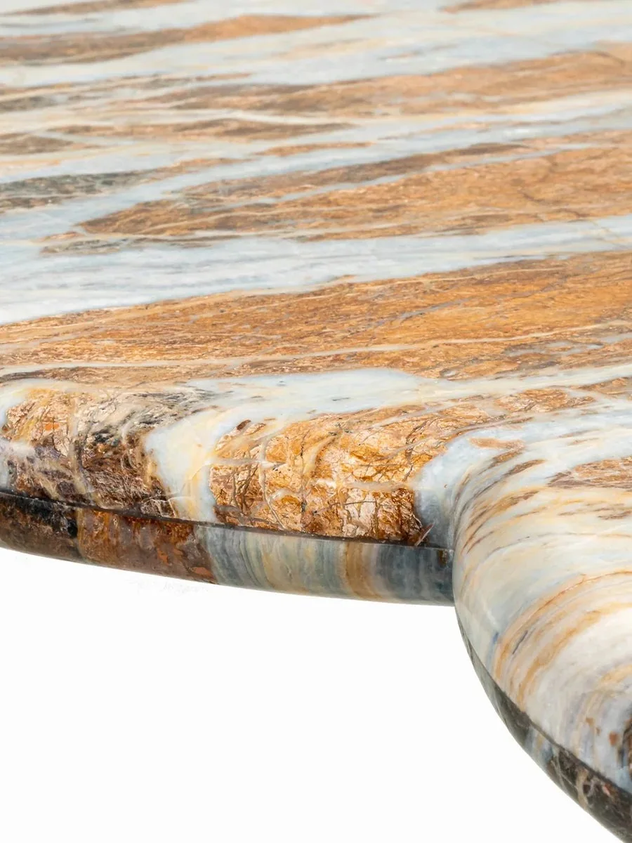 Edge close-up of a stone tabletop.