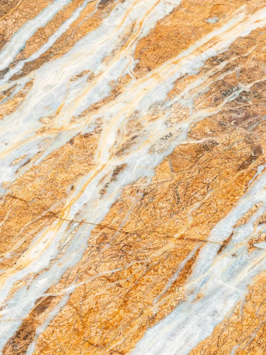 Surface close-up of a veined stone tabletop.