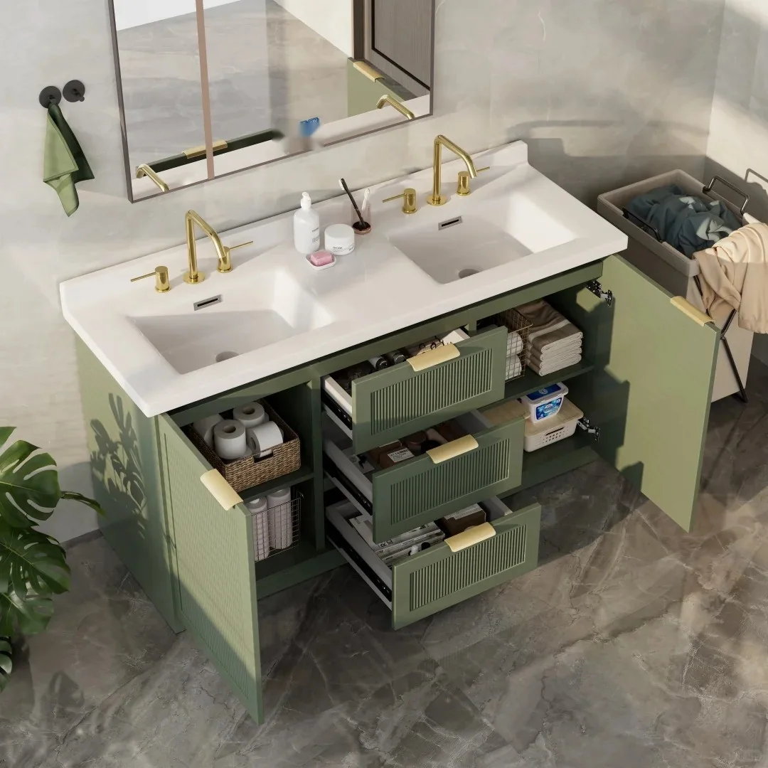 Bathroom vanity opened to show drawers, cabinet storage, hinges and internal organization