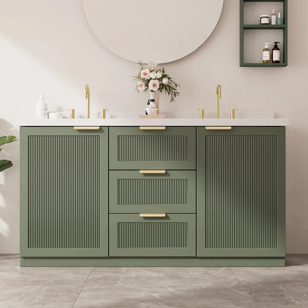 Green custom bathroom vanity with double basin, fluted cabinet fronts and brass hardware