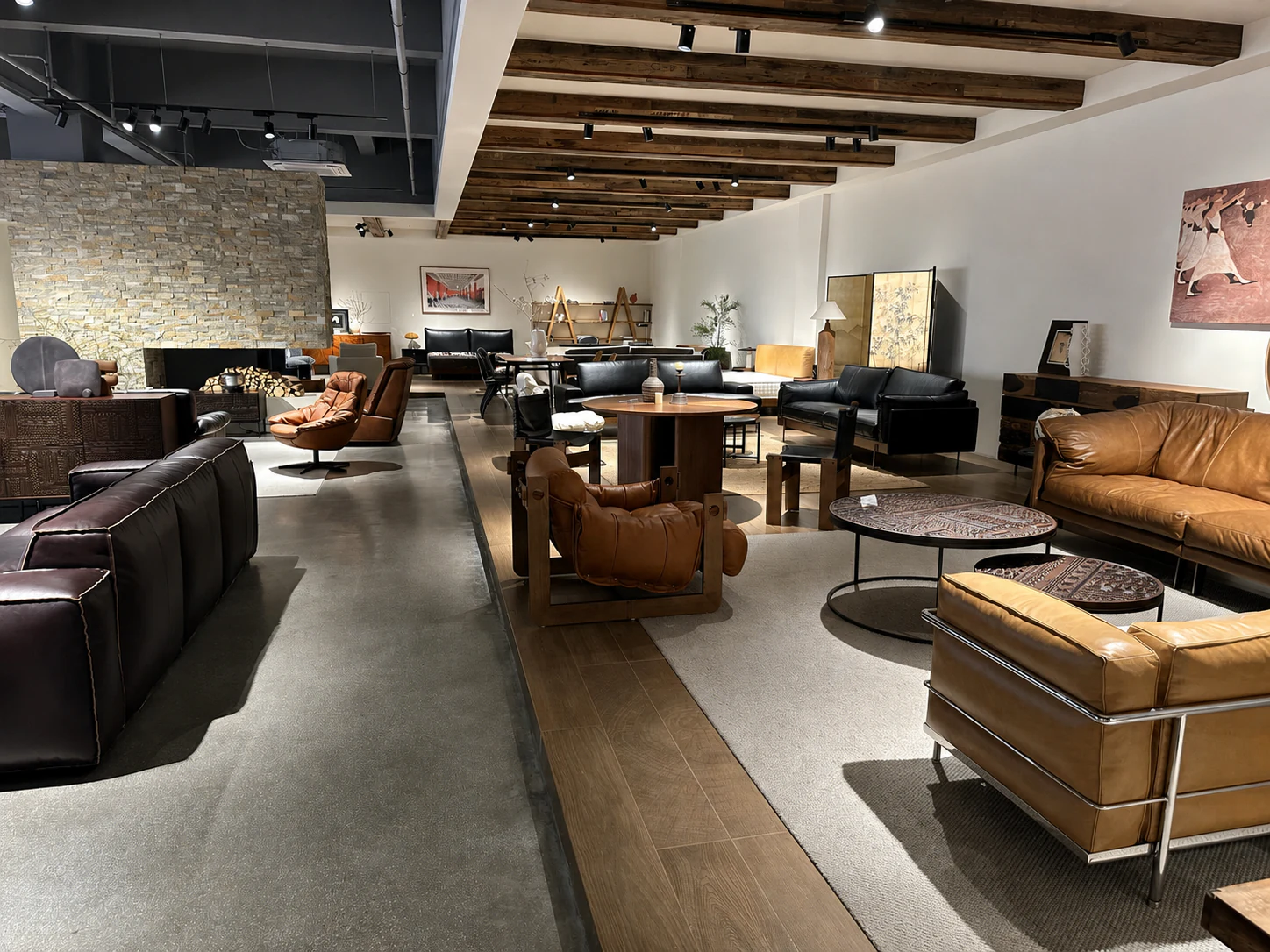 Large Foshan furniture showroom with leather sofas and tables