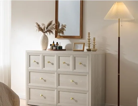 Light painted dresser in bedroom setting