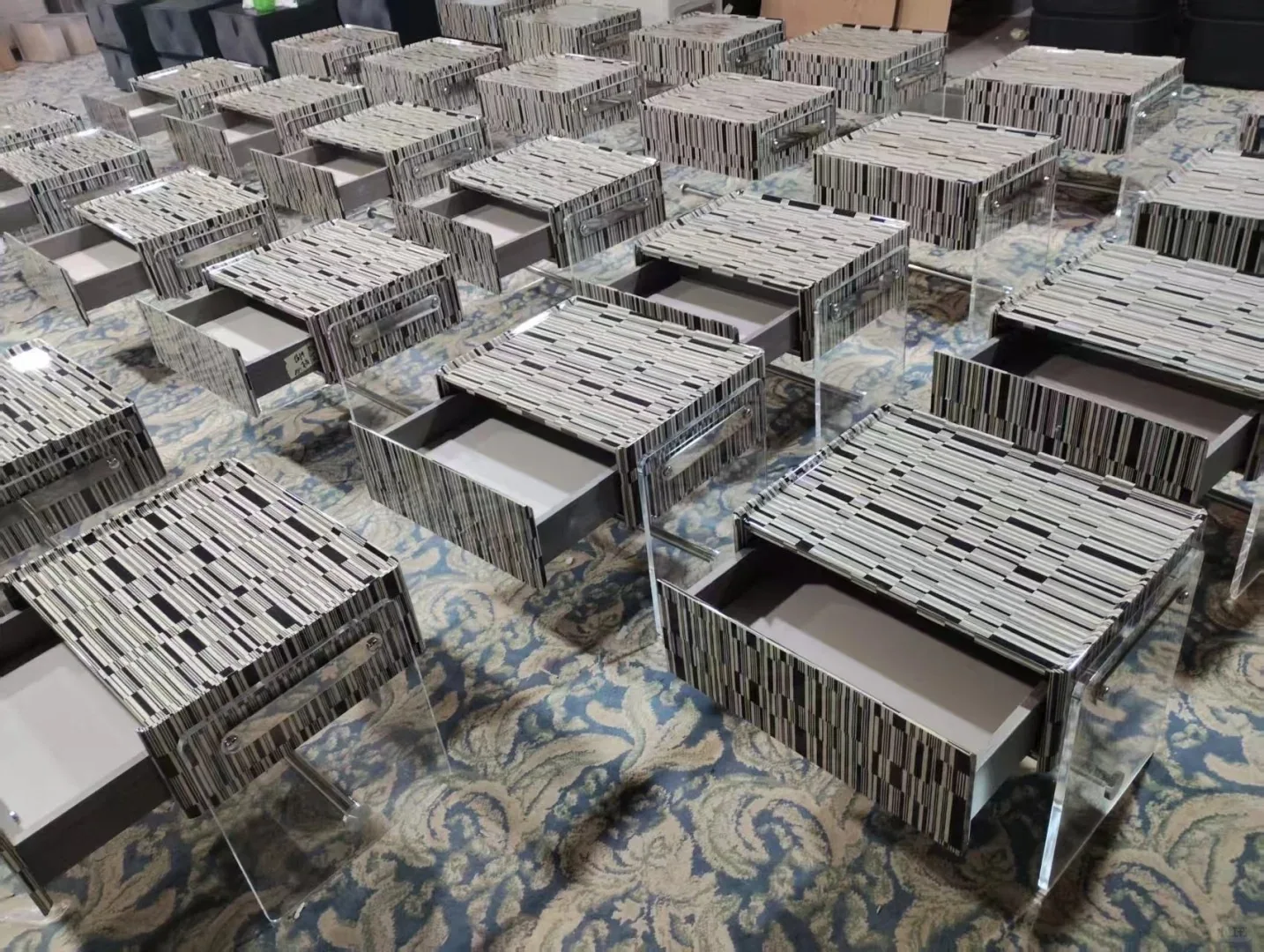 Factory display of mosaic nightstands with acrylic bases