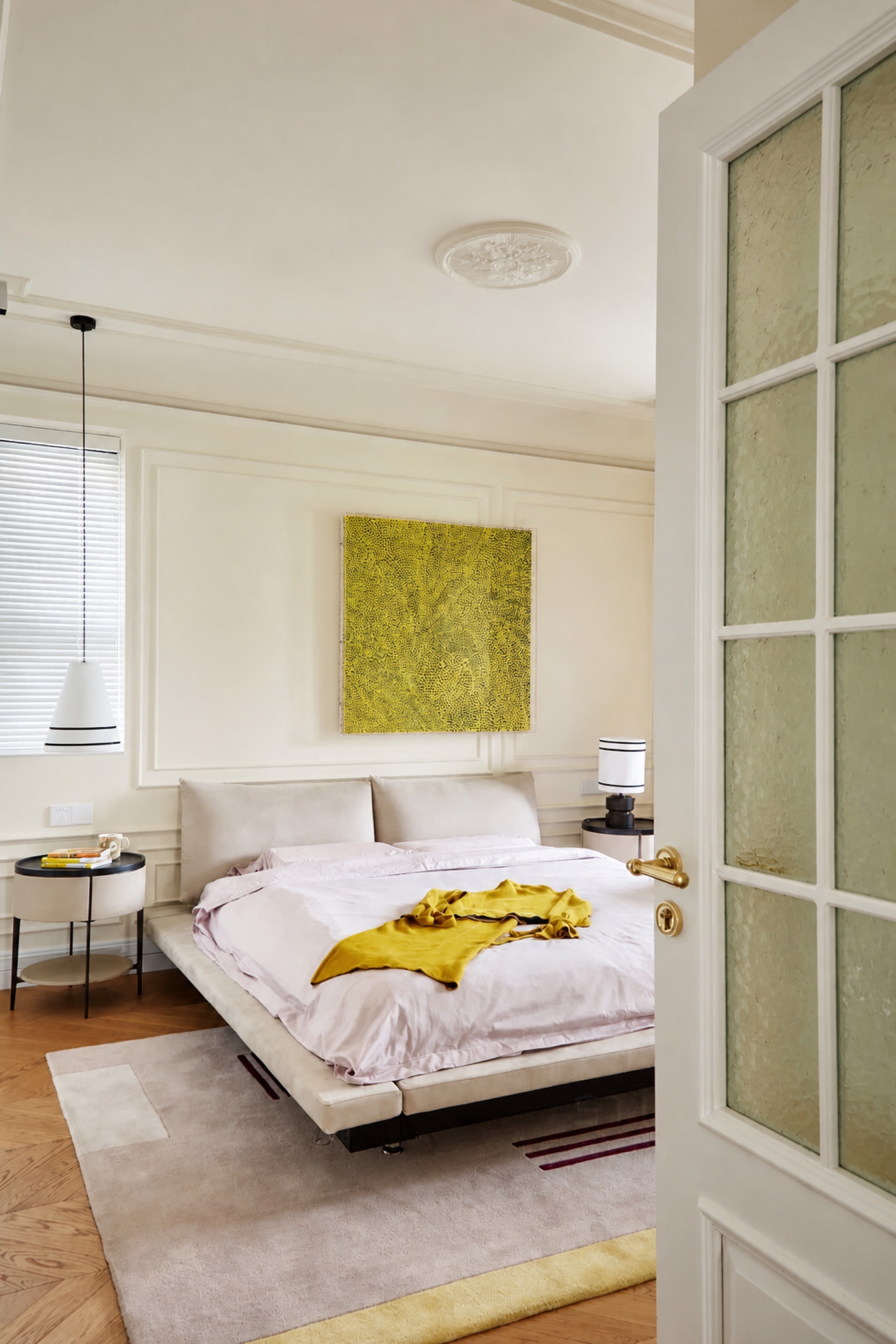 Minimalist bedroom with upholstered bed and cozy modern furniture design