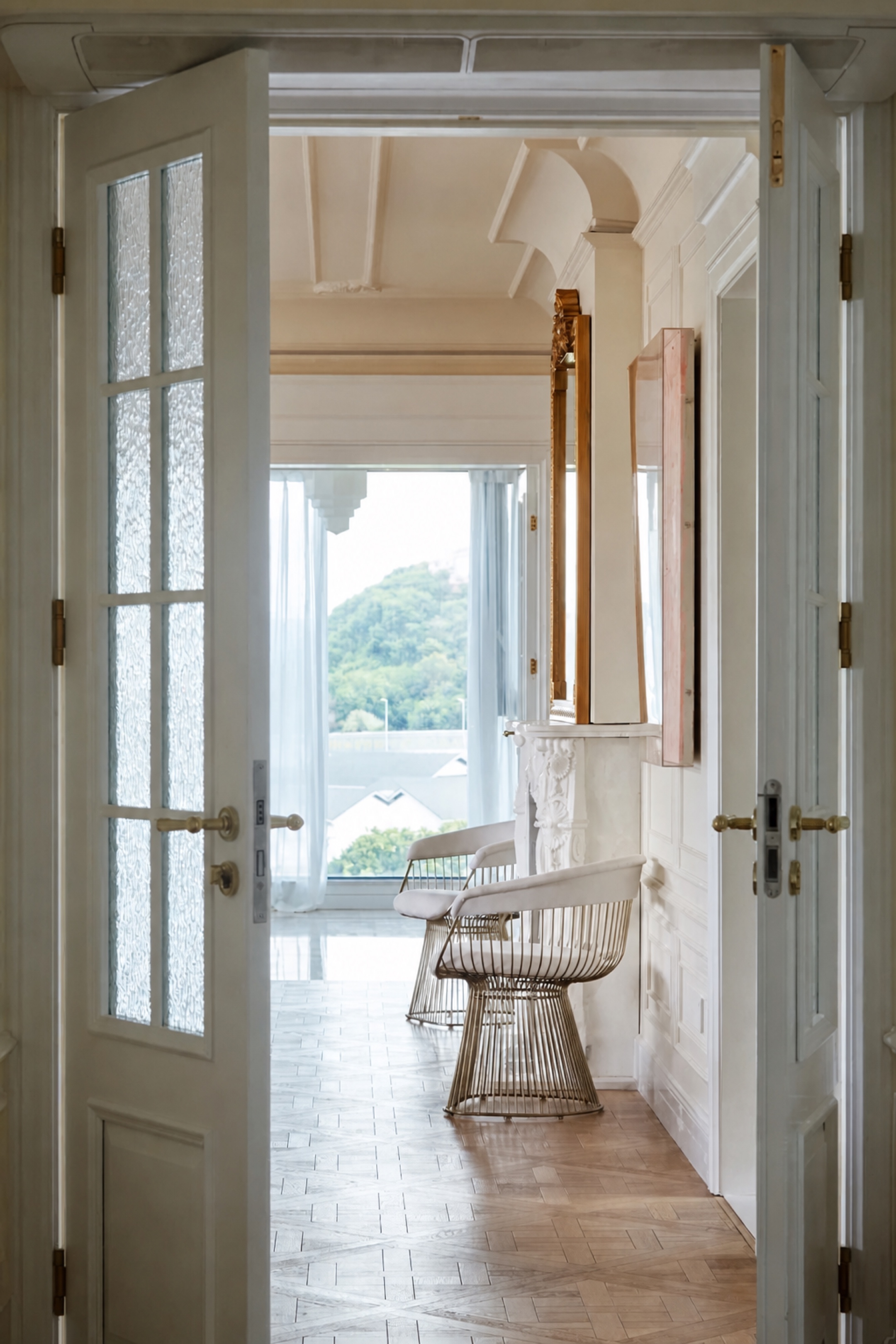 Elegant interior combining classic architecture with modern furniture