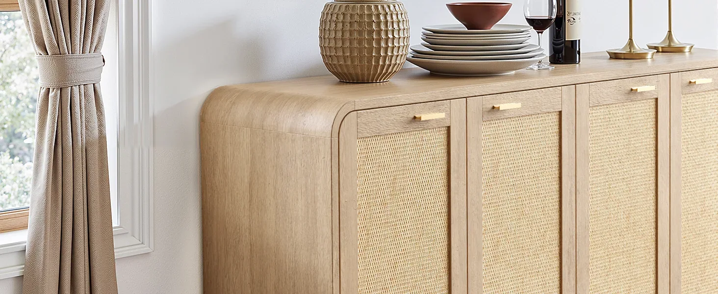 Close view of a sideboard with rounded wood edges and woven rattan door panels