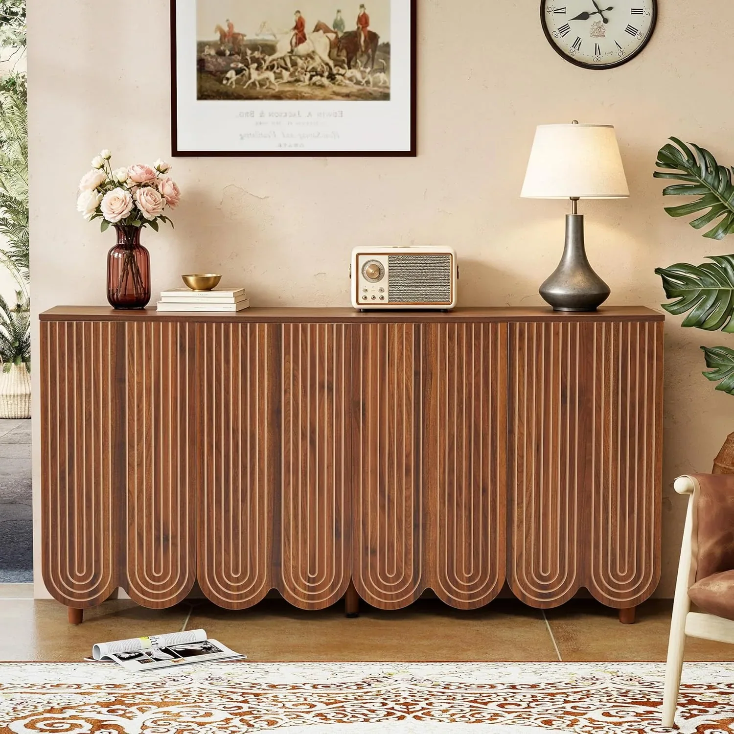 Walnut sideboard with repeated arched fluted doors in a warm living space