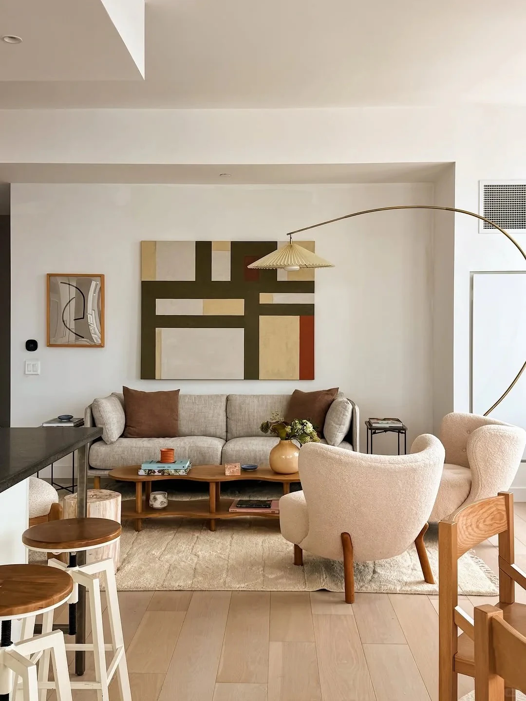 Warm residential living room showing whole-home furnishing results