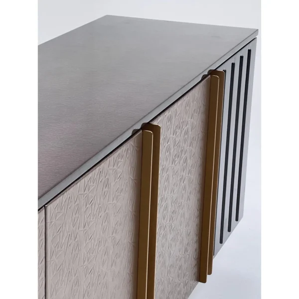 Ribbed and Embossed Leather Sideboard on Brass Base in clay — in a room setting