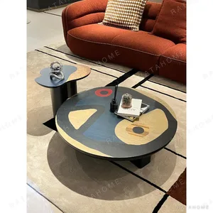 Abstract Marquetry Round Coffee Table Set with Side Table in black — in a room setting