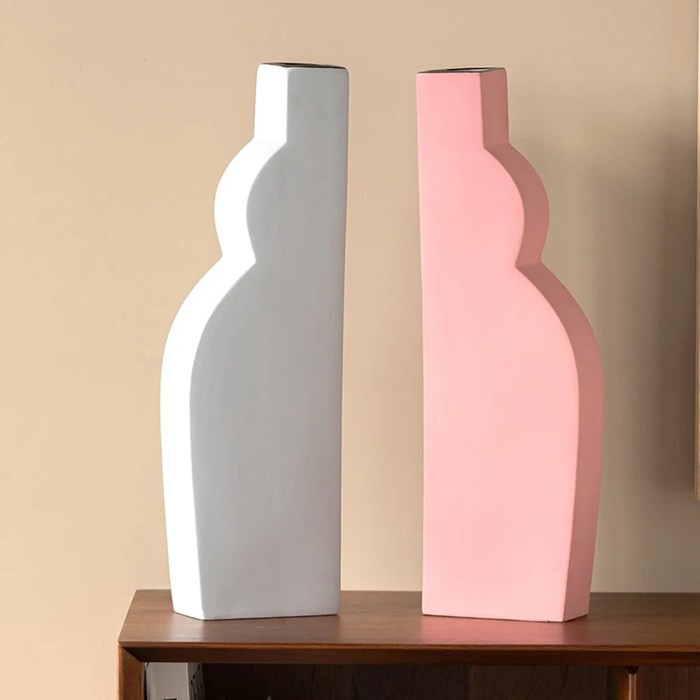 Abstract Curved Silhouette Ceramic Vases in White and Pink — front view