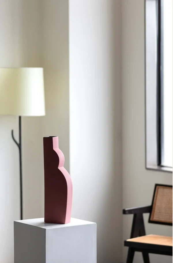 Abstract Curved Silhouette Ceramic Vases in White and Pink — in a room setting