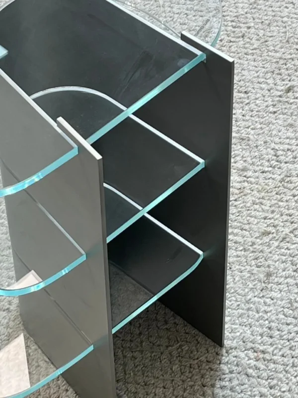Three-Tier Glass Side Table on Curved Grey Metal Spine in slate — detail
