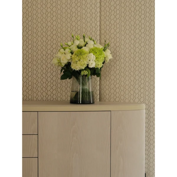 Alison Oval Sideboard in oatmeal — in a room setting
