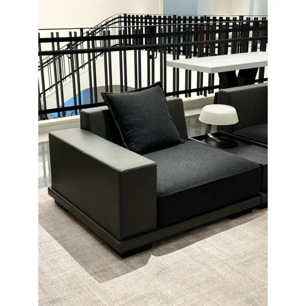 Low Modular Sofa in Black Leather and Fabric — in a room setting