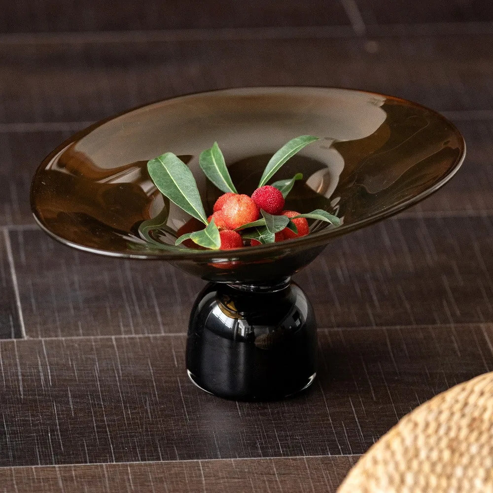 Amber and Black Hand-Made Footed Glass Fruit Bowl in clay — front view