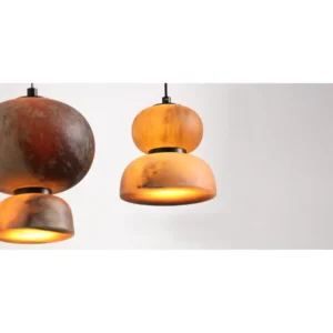 Amber Layered Glass Round-Belly Pendant Light, 15 cm in rust — in a room setting
