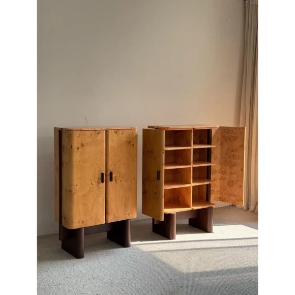 Amber Burl Veneer Curved Cabinet Pair on Dark Wood Legs in mustard — in a room setting