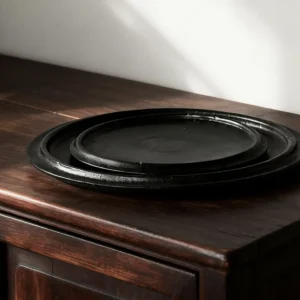 Handmade Black Swirl Stoneware Plates in black — front view