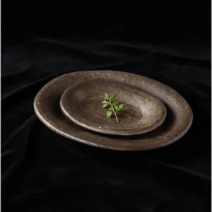 Artist Collaboration Brown Sand Glaze Oval Stoneware Plates in clay — front view