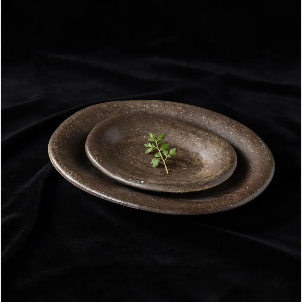 Artist Collaboration Brown Sand Glaze Oval Stoneware Plates in clay — front view