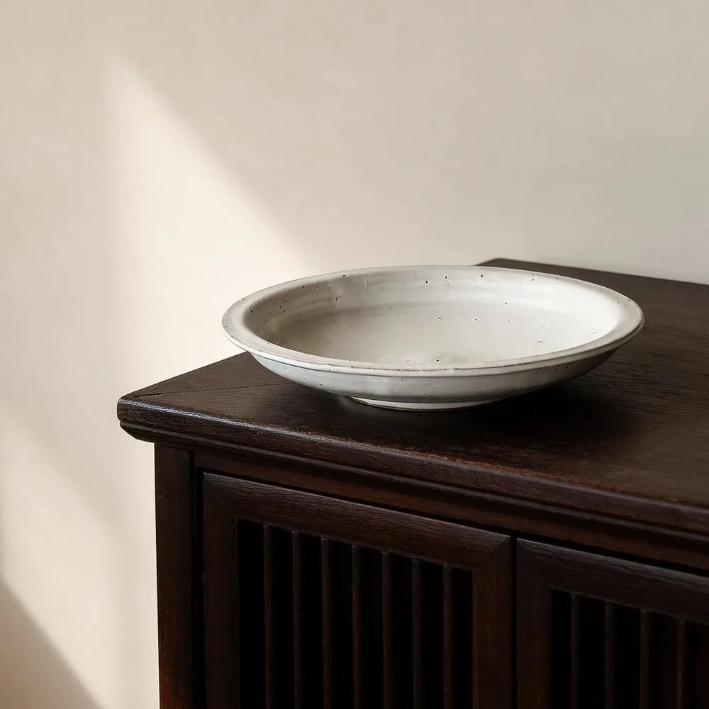Artist Collaboration Speckled White Ceramic Dinner Plates in ivory — front view