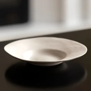 Artist Collaboration Cream Ripple-Edge Irregular Plate in oatmeal — front view