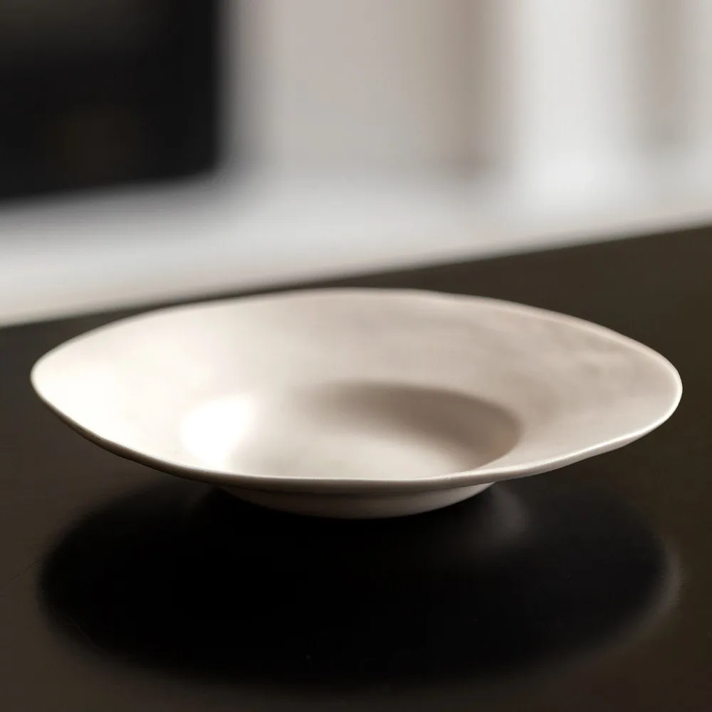 Artist Collaboration Cream Ripple-Edge Irregular Plate in oatmeal — front view