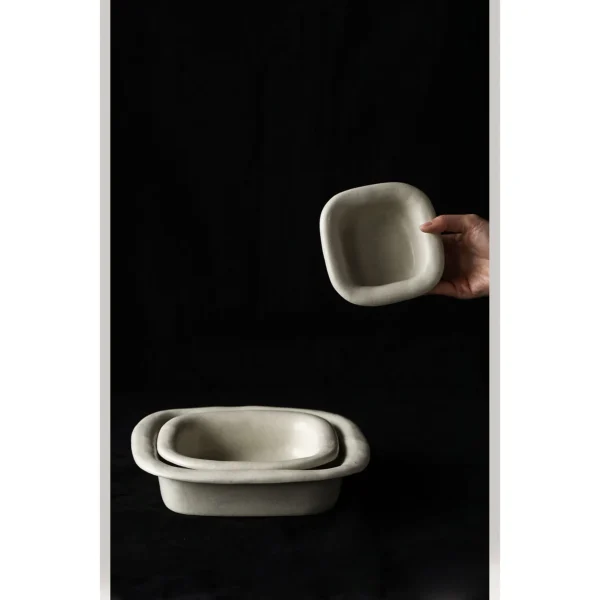 Artist Collaboration Folded-Edge Square Ceramic Dishes in oatmeal — in a room setting