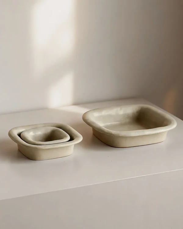 Artist Collaboration Folded-Edge Square Ceramic Dishes in oatmeal — in a room setting