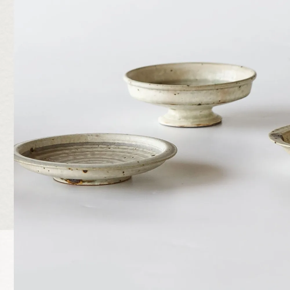Artist Collaboration Green-Glaze Stoneware Footed Plates in olive — front view
