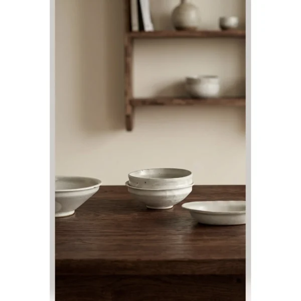 Artist Collaboration Kohiki White-Slip Ceramic Bowls in ivory — in a room setting
