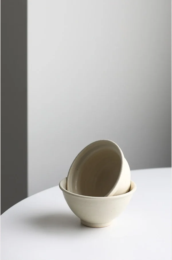 Artist Collaboration Rice-Glaze Plain Ceramic Bowl in oatmeal — in a room setting