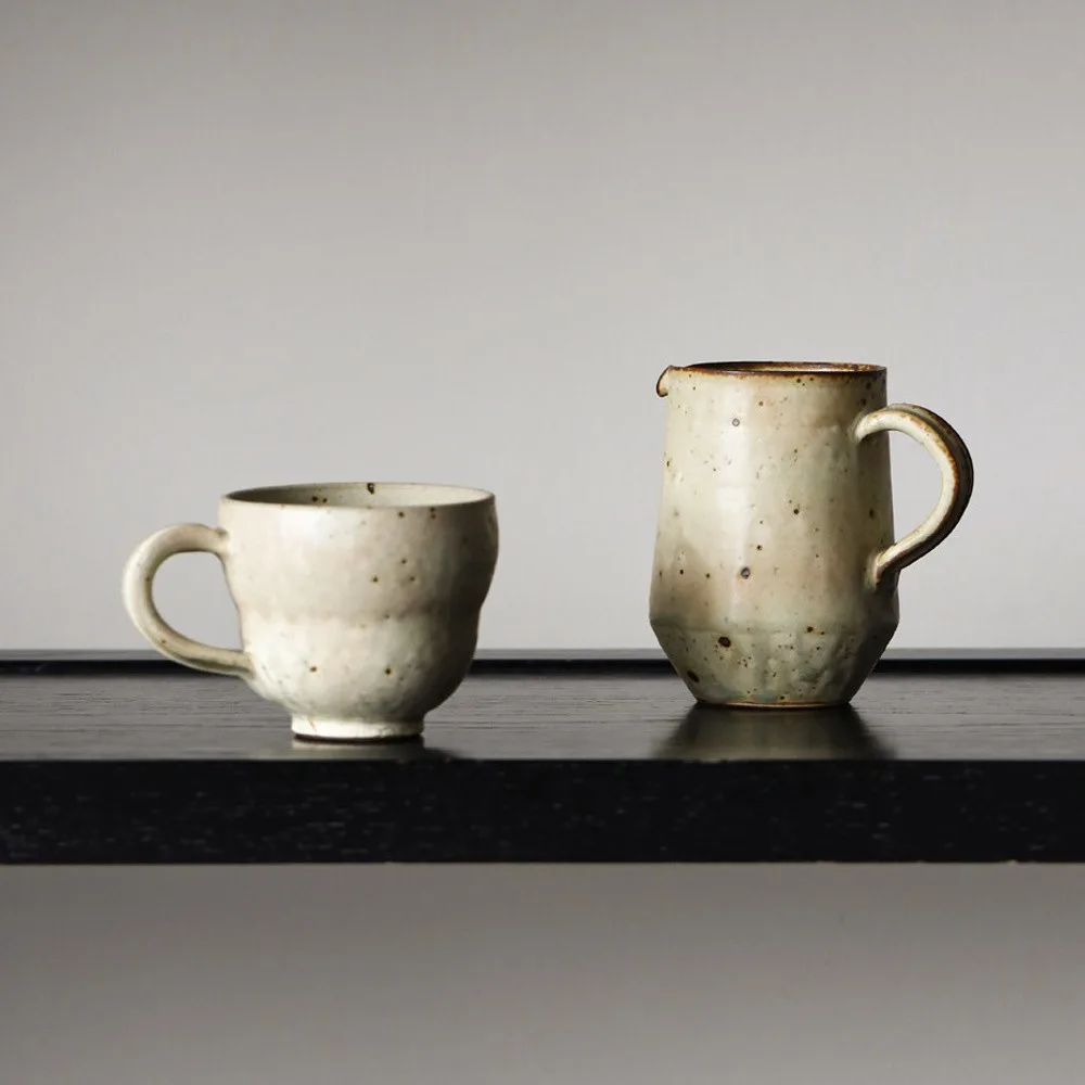 Artist Collaboration Stoneware Coffee Mug and Jug in olive — front view